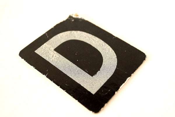 Vintage Alphabet Letter D Card with Textured Surface in Black